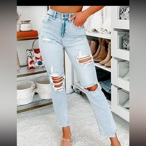 Sneak Peek High Rise Distressed Skinny Jeans